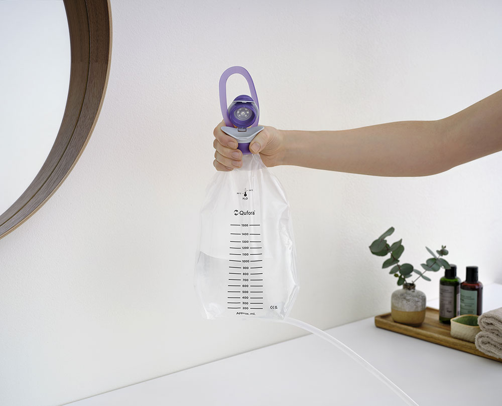 Hand holding flow water bag